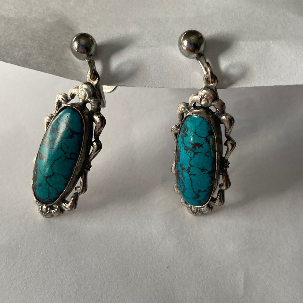 Vintage Navajo Elegant Turquoise and Silver Earrings clipped together by screw